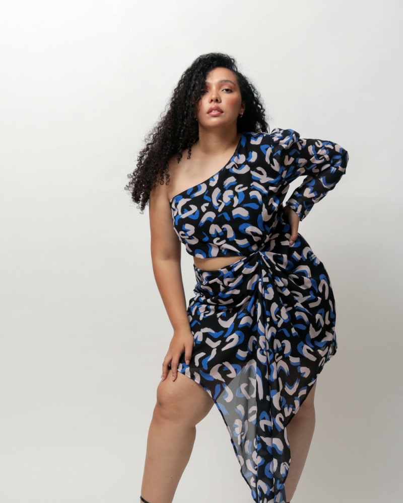 Front of a model wearing a size L (12/14) Kat One-Shoulder Dress in Black and Blue Horseshoe Print by LuvMeMore. | dia_product_style_image_id:266654